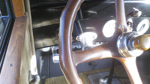 Steering wheel inside a 1923 Cadillac.