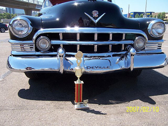Cadillac bumper and winning trophy from Car show