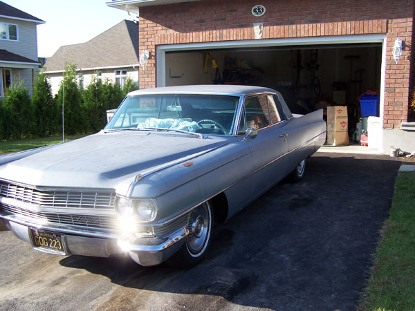 1963 Cadillac picture in a driveway