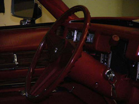 inside picture of steering wheel of cadillac deville