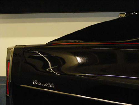 rear tail of a 1976 Cadillac.