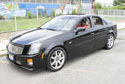 Lamont in his black 2005 Cadillac CTS-V