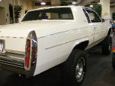rear of white cadillac