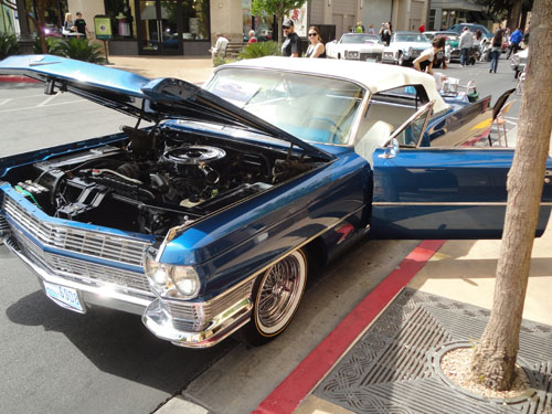 blue and white Cadillac convertible