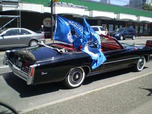 1976 Cadillac El Dorado convertible with Vancouver Canucks flags.