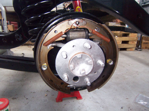 1959 Cadillac brakes being repaired.