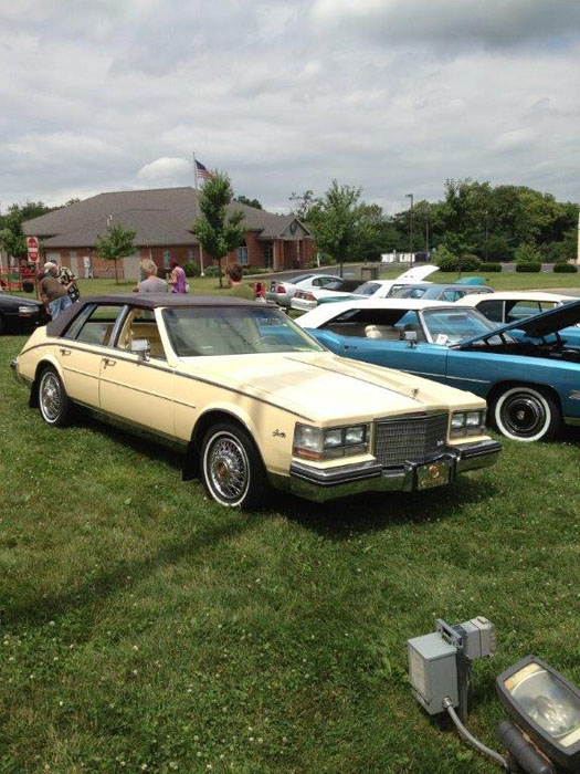 Yellow 1980s Cadillac